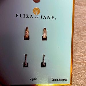 Silver and gold, delicate hoop earrings.